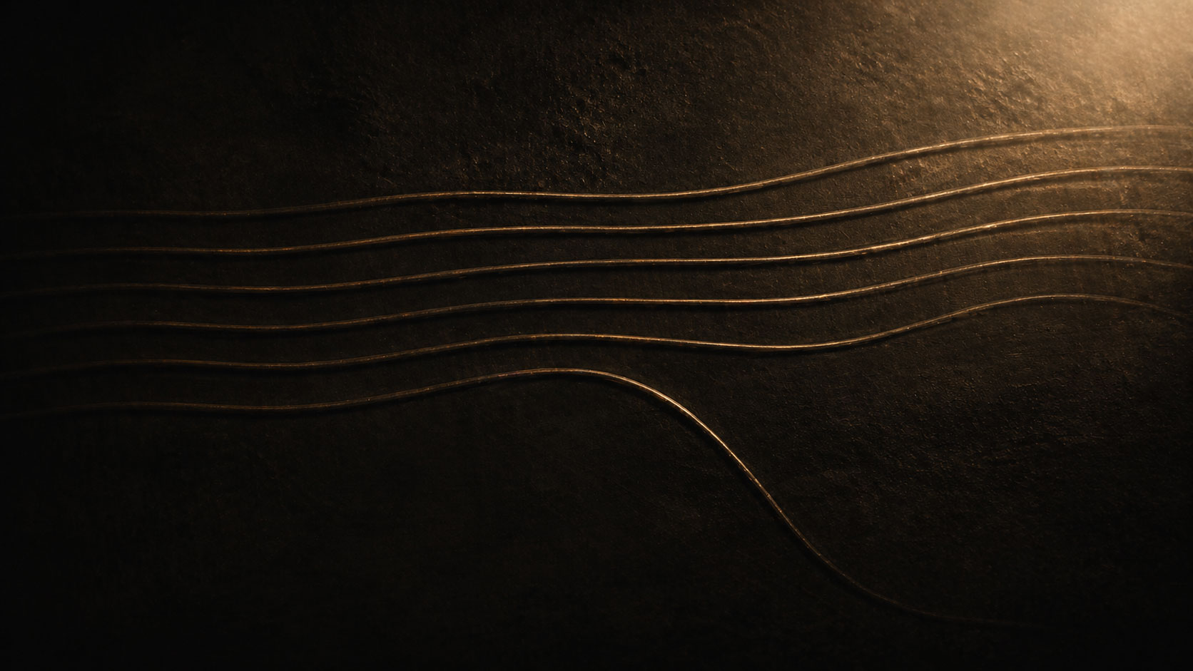 Multiple thin, parallel, curved lines run horizontally across a dark textured surface.